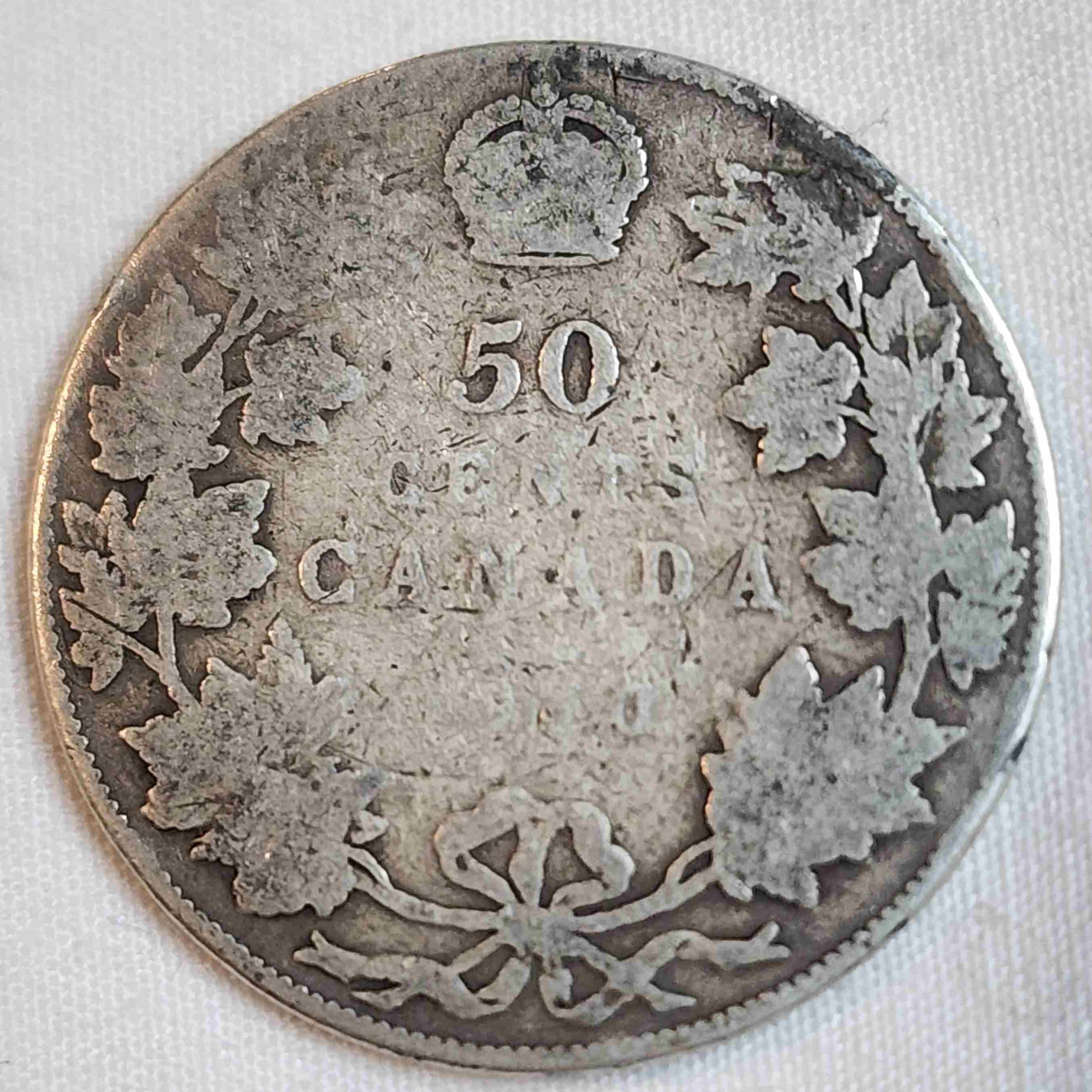 Anyway-To-Tell-Which-Leaves-These-2-Ag-1910-50-Cent-Pieces-Are?